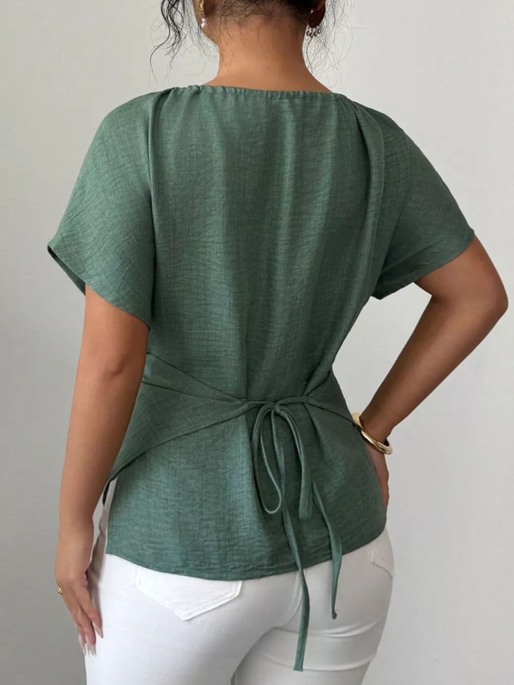Green short sleeve maternity blouse with tie waist detail