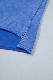 Blue cotton t-shirt with side slits and acid wash detail