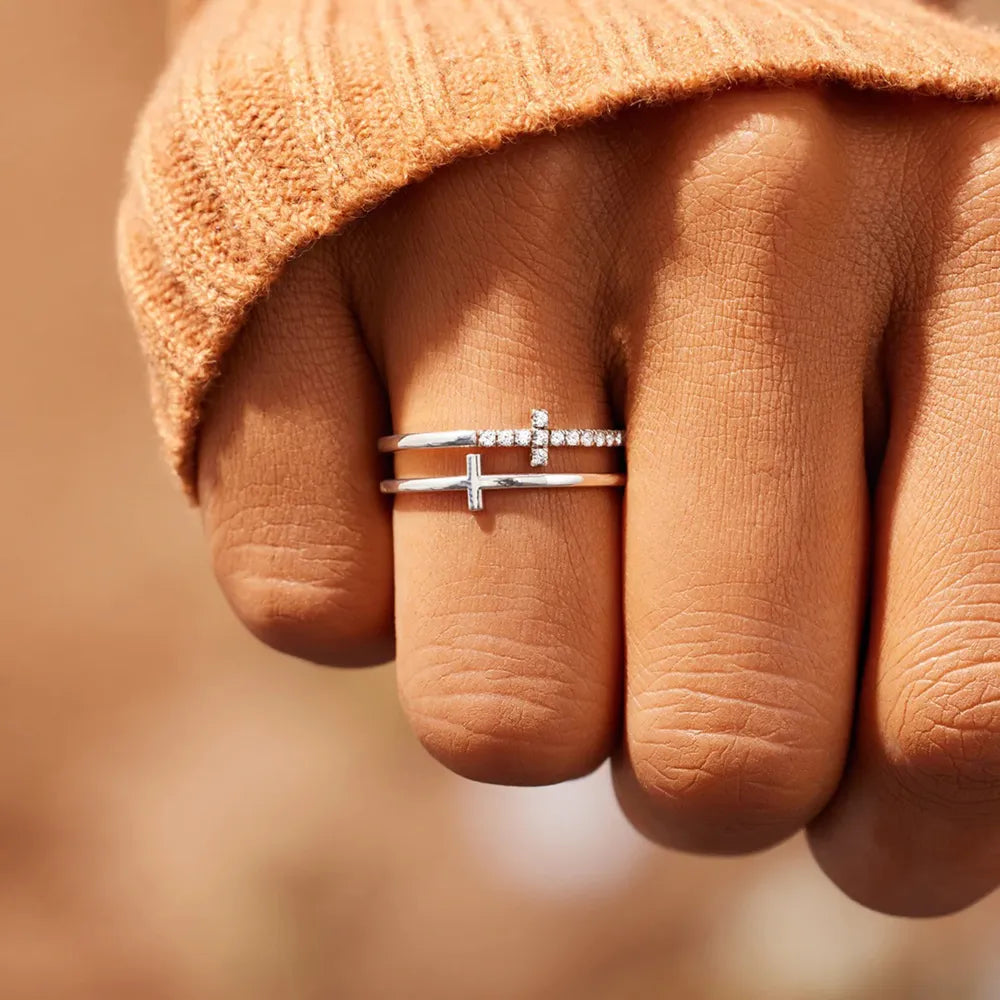 Double Cross Diamond Band Ring in silver with two stacked bands, one with pave diamonds and a cross, the other with a simple