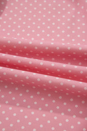 Pink polyester blouse with white polka dots