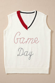 White knit vest with embroidered Game Day text, burgundy and black trim V-neck.