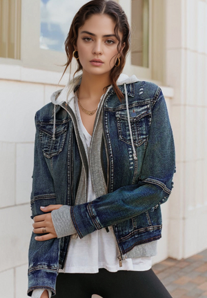 Hybrid denim jacket with grey hooded layer, distressed details, and zip front.