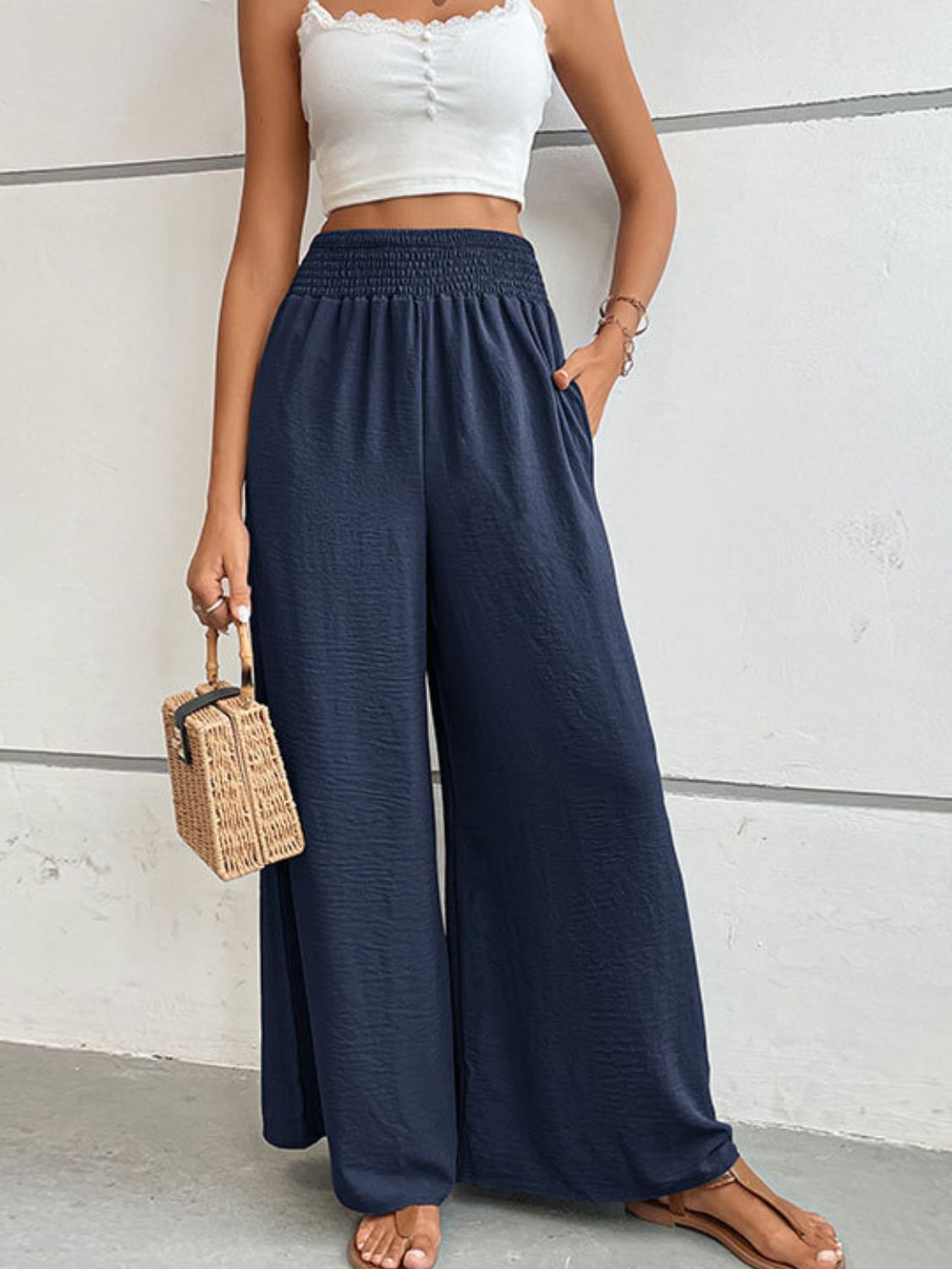Dark blue textured smocked waist palazzo maternity trousers with pockets
