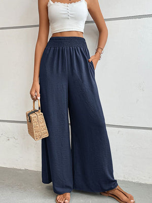 Dark blue textured smocked waist palazzo maternity trousers with pockets