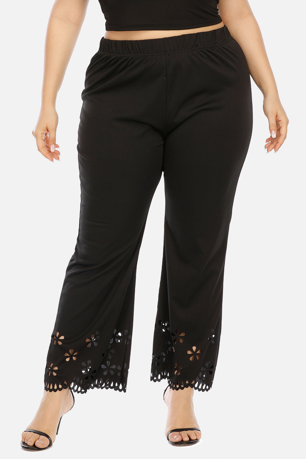 Black flare trousers with floral hem detail