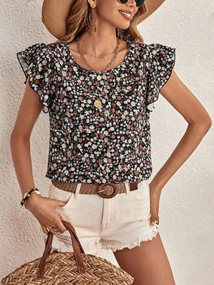 Black floral print blouse with flutter sleeves and button front detail.