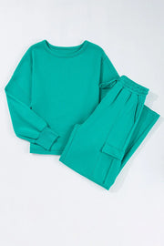 Turquoise relaxed fit lounge set with crewneck sweatshirt and cargo pocket pants.