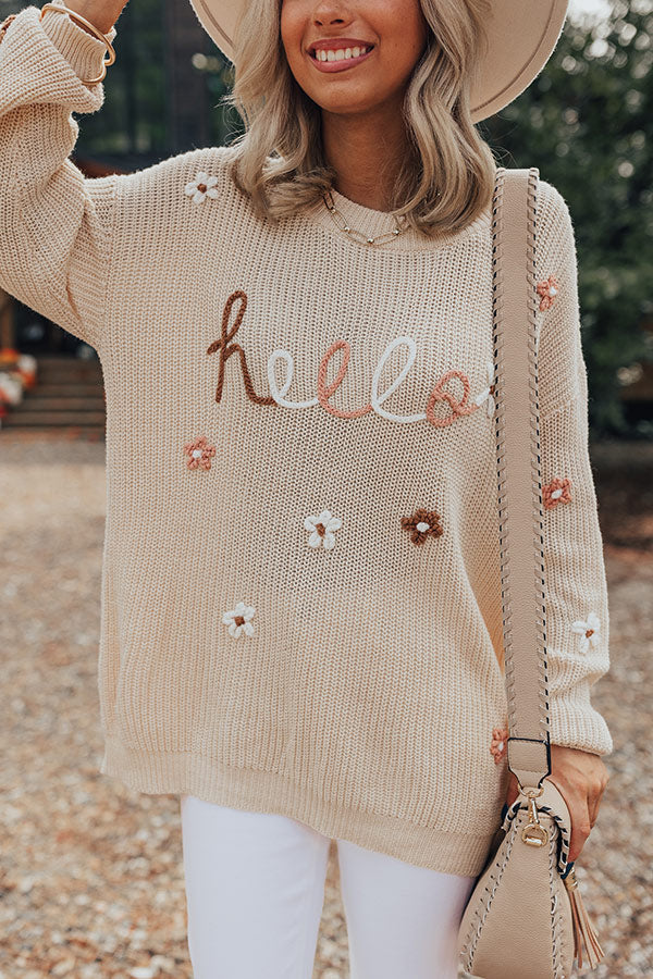 Hello Embroidered Floral Knit Sweater in Khaki with crew neck and long sleeves.