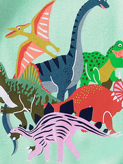 Toddler graphic tee with colorful dinosaur print on light green cotton blend fabric.