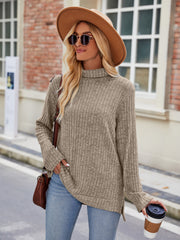 Ribbed turtleneck sweater in Khaki with side slits and bell sleeves.