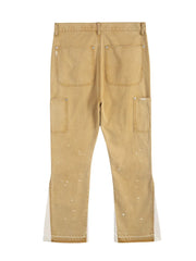 Split panel bootcut jeans in coffee brown with white paint splatters and side panels.