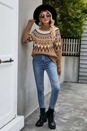 Geometric knit turtleneck sweater in camel with a fair isle pattern.