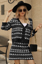 Black argyle knit cardigan and mini skirt set with button front and v-neck