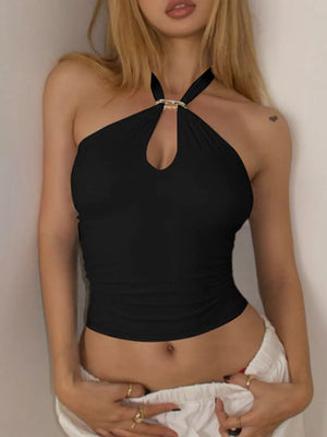 Black halter cami with crisscross straps and keyhole cutout with gold ring accent.