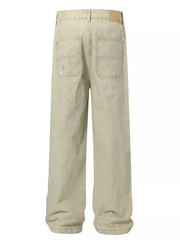 Apricot loose fit sweatpants with ink-splash detail and back pockets.