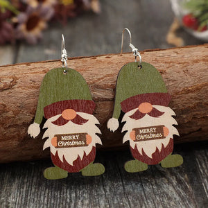 Merry Christmas gnome wood dangle earrings in matcha green with festive details.