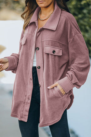 Fleece shirt jacket in Blush Pink with patch pockets and button front.