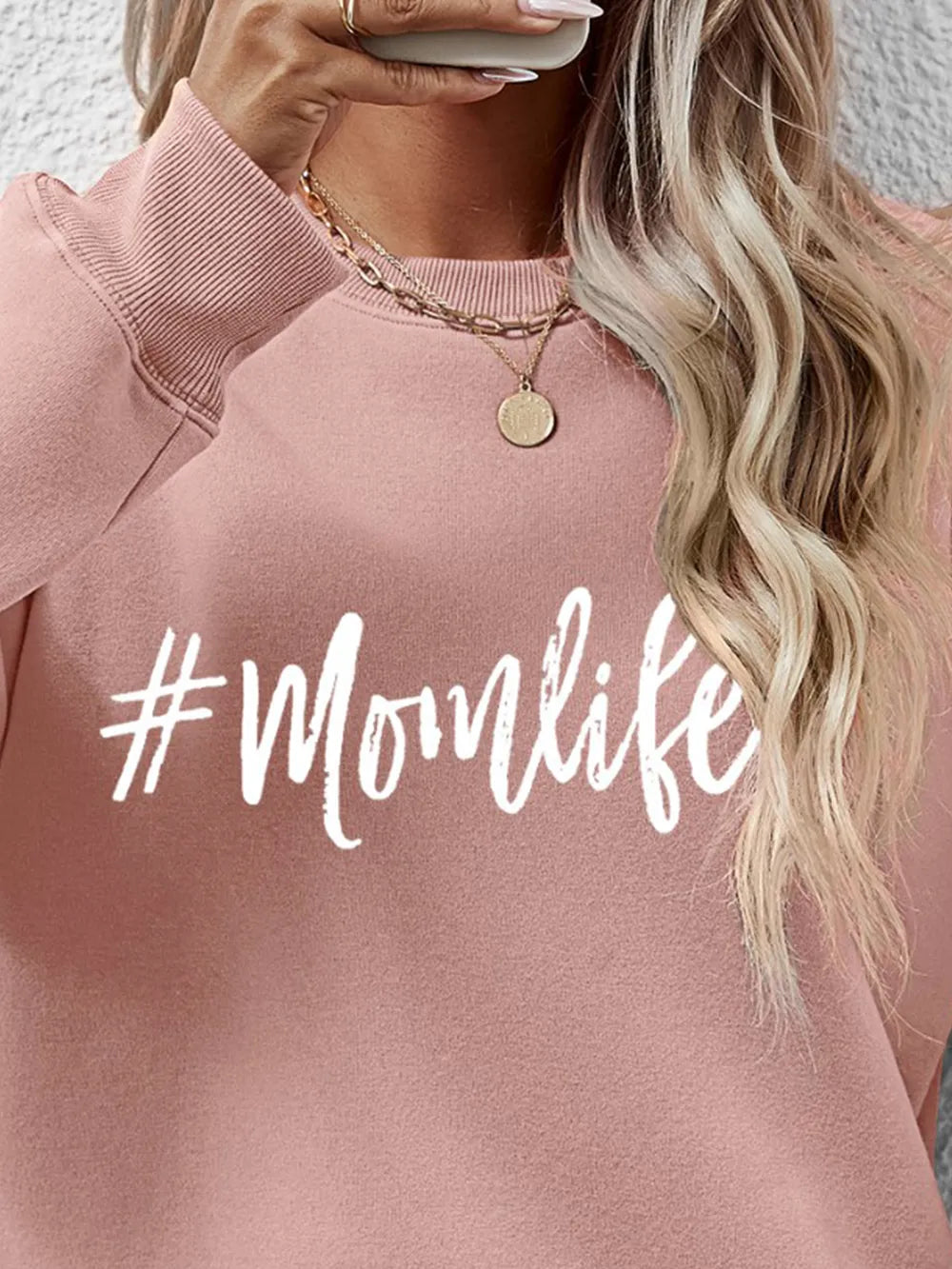 Crewneck sweatshirt in Blush Pink with #Momlife graphic, crew neck, long sleeves.