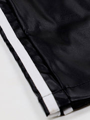 Black faux leather wide leg track pants with white side stripes and elastic waistband.