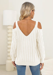 White open shoulder cable knit sweater with V-neck and ribbed detail