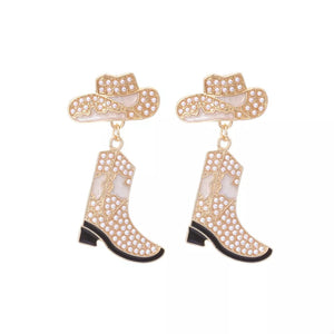 Cowboy hat and boot dangle earrings in ivory white with pearl accents.