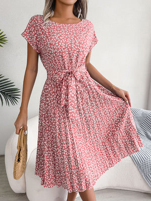 Floral print midi dress in blush pink with tie waist and pleated skirt