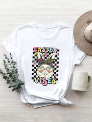 White graphic tee with bunny wearing heart sunglasses and bandana, "Easter Vibes" text, 100% polyester