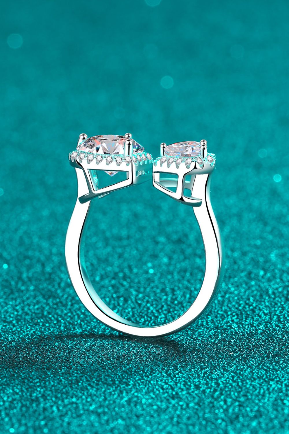 Double Heart Halo Ring in silver sterling silver with two halo-set cubic zirconia stones.