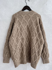 Sparkle knit relaxed fit sweater in beige with diamond cable knit pattern and crewneck.