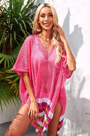 Rose pink crochet cover-up with rainbow hemline and V-neck, styled with jewelry.