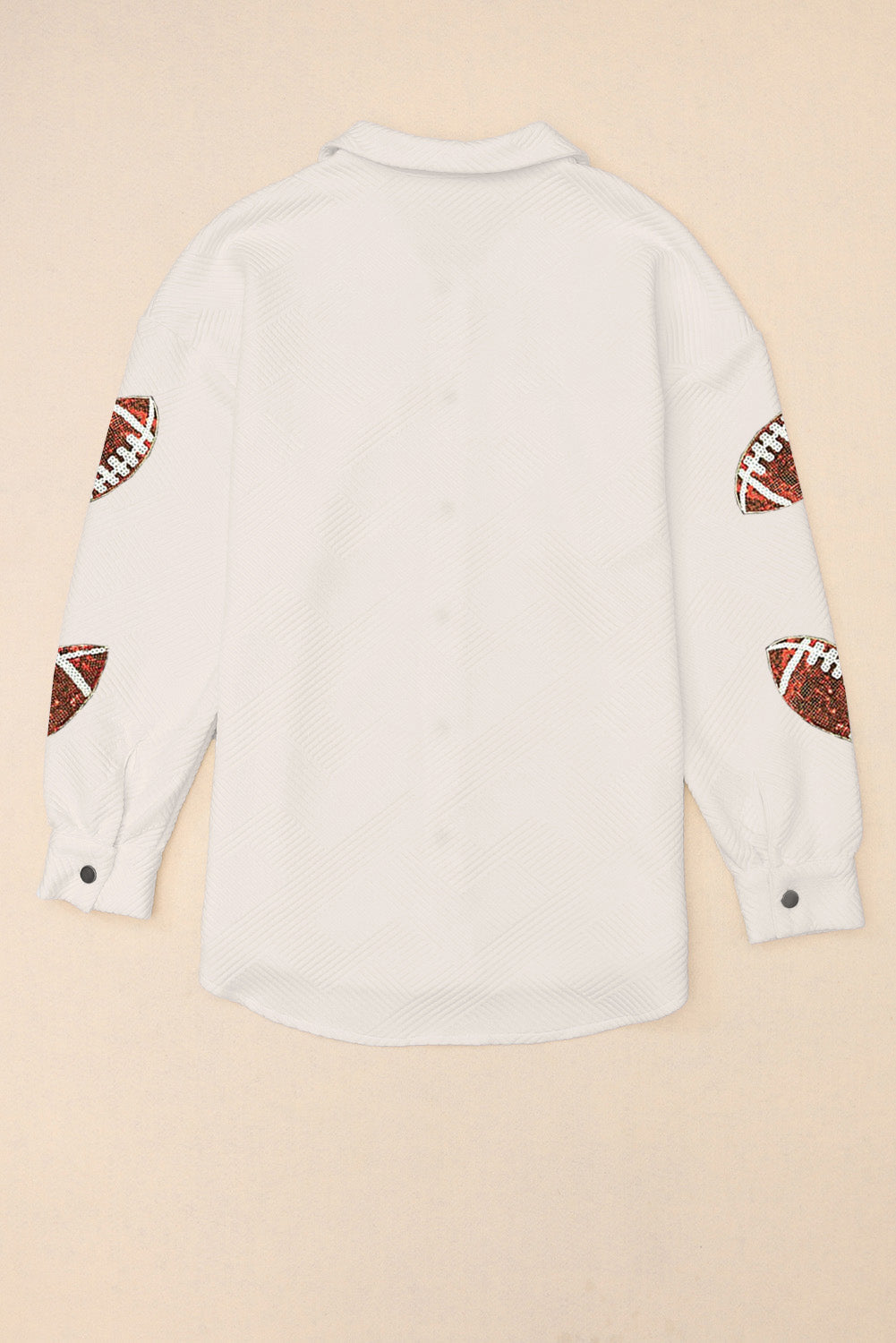 White textured overshirt with football appliqué on sleeves.
