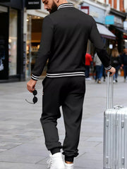 Men's black tracksuit set with white striped cuffs and collar, perfect for activewear.