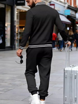 Men's black tracksuit set with white striped cuffs and collar, perfect for activewear.