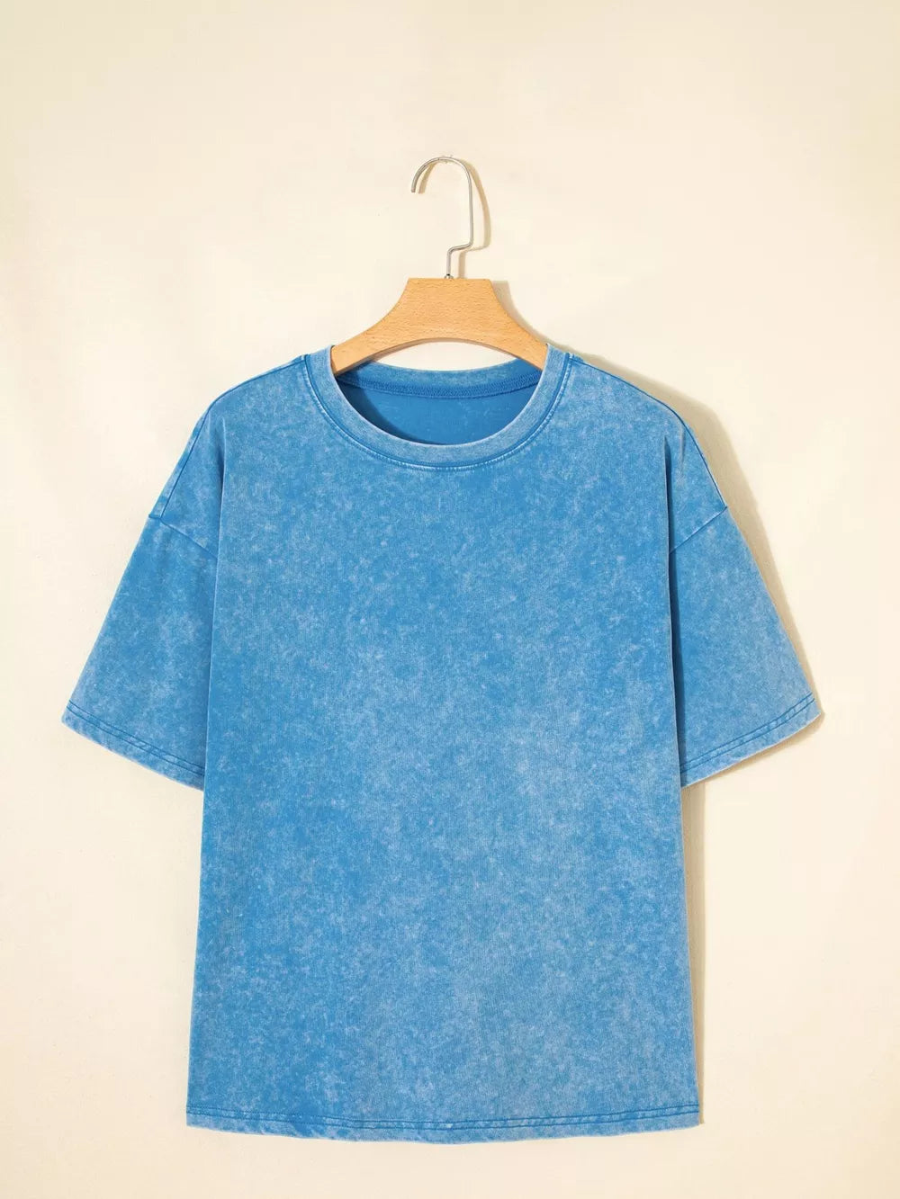 Mineral washed blue cotton crew neck oversized t-shirt with short sleeves.