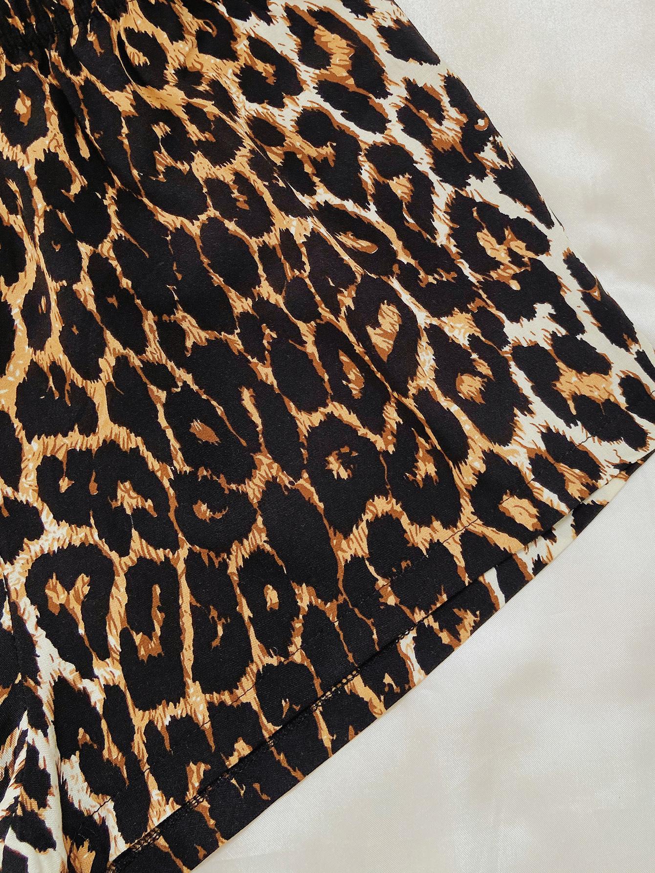 Black leopard print pajama shorts with elastic waistband detail