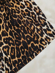Black leopard print pajama shorts with elastic waistband detail