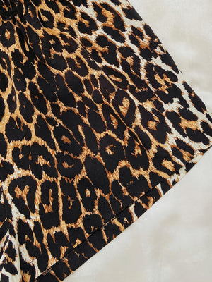 Black leopard print pajama shorts with elastic waistband detail
