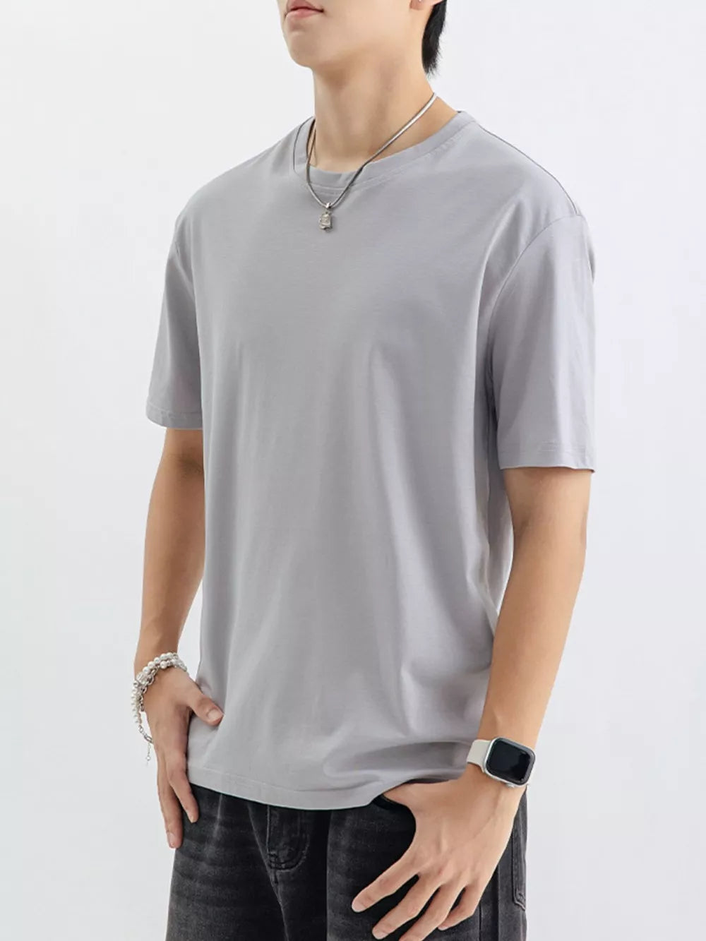 Men's light gray cotton crew neck t-shirt with short sleeves.
