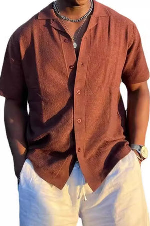 Textured Cuban collar shirt in terracotta with short sleeves and a button-up front.