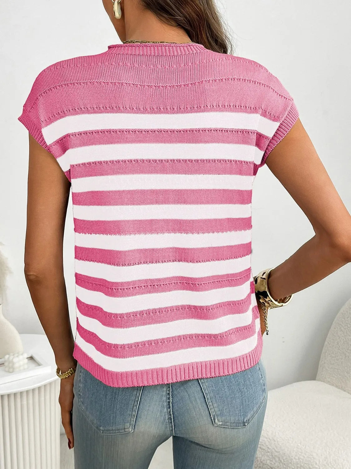 Striped knit t-shirt in blush pink and white with short sleeves and a crew neck.