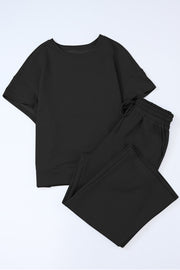 Black textured knit tee and wide leg pants set with drawstring waist