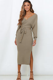 Khaki wrap-front midi knit dress with V-neck, long sleeves, belted waist, and side slit.