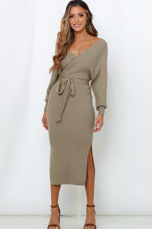 Khaki wrap-front midi knit dress with V-neck, long sleeves, belted waist, and side slit.