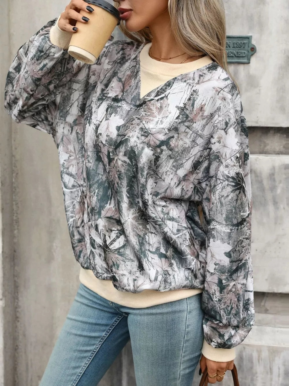 65% viscose, 30% polyester, 5% elastane Care instructions: Machine wash cold sweatshirt in mauve with relaxed silhouette