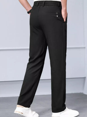 Black classic fit sweatpants with elastic waist and zippered back pocket detail.