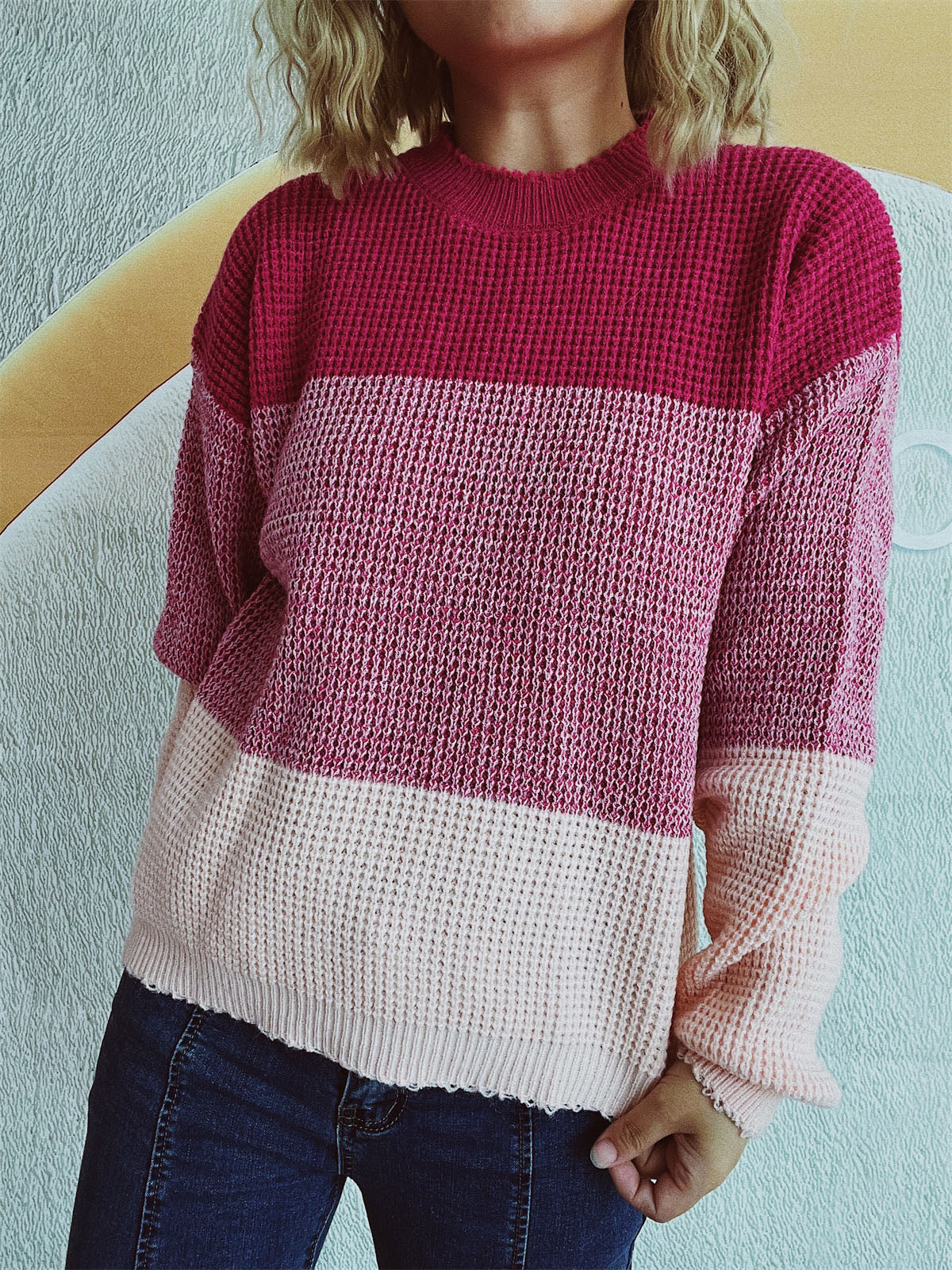 Colorblock textured knit pullover sweater with crew neck and waffle knit detail.