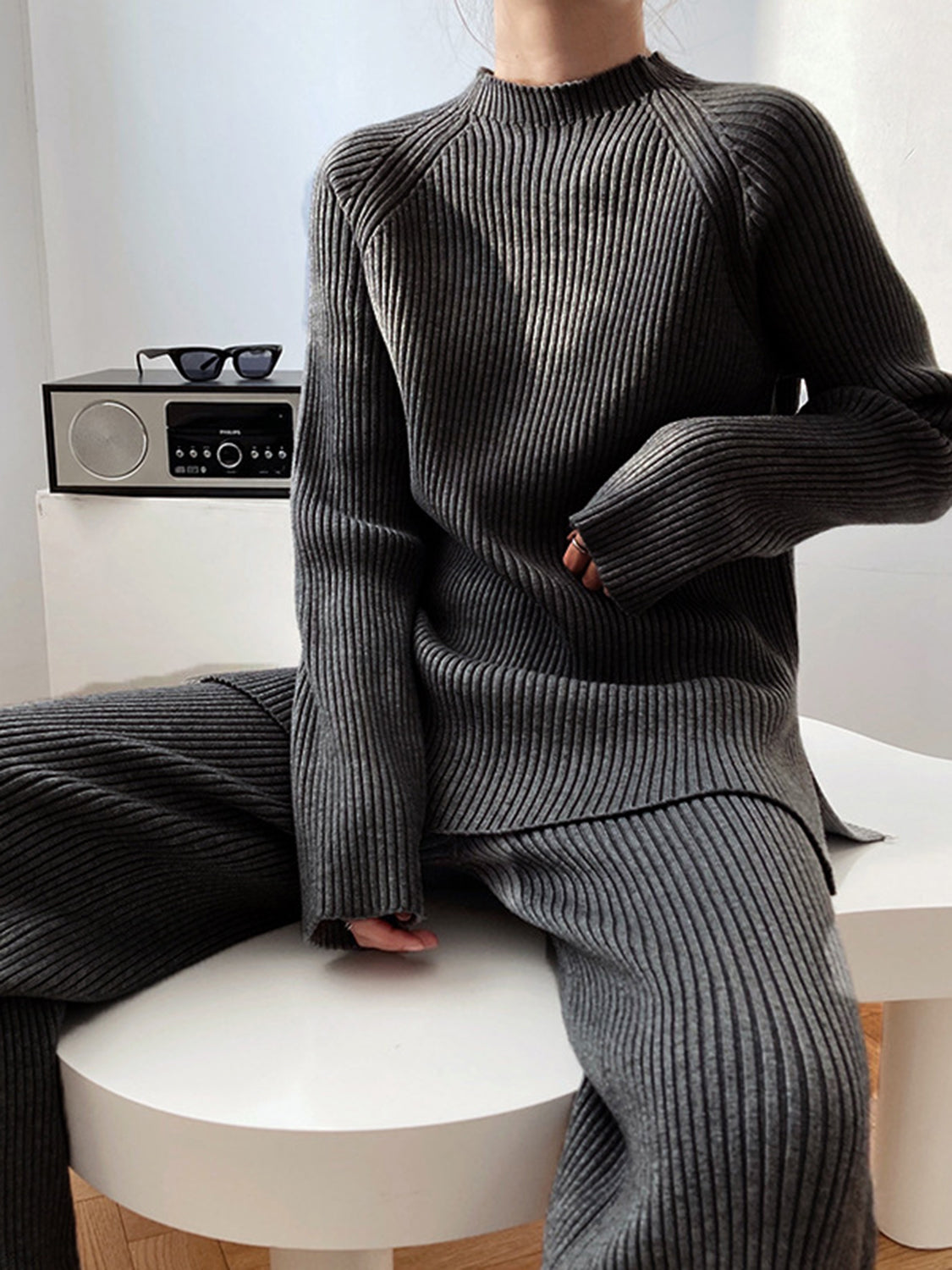 Dark Gray ribbed knit co-ord set with mock neck sweater and wide leg pants.