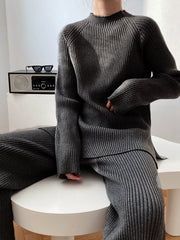 Dark Gray ribbed knit co-ord set with mock neck sweater and wide leg pants.