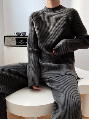 Dark Gray ribbed knit co-ord set with mock neck sweater and wide leg pants.