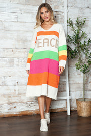 Beige sweater dress with rainbow stripes and "PEACE" lettering, V-neck, midi length